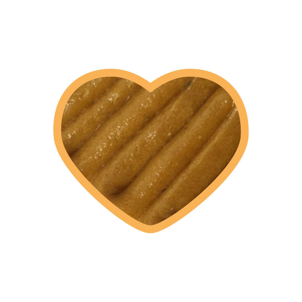 Konsistenz der entoVITAL DOG Vitamin Boost Puppy Schleckpaste, in Herzform dargestellt