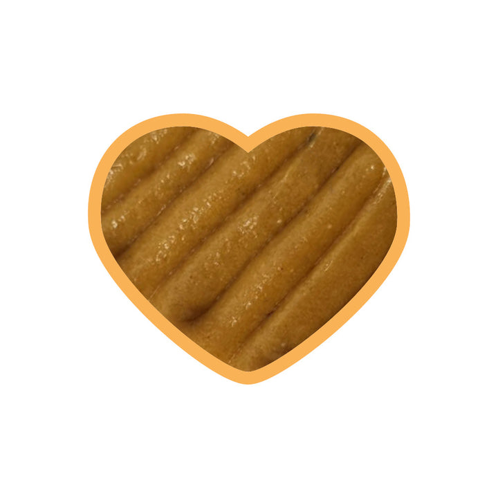 Konsistenz der entoVITAL DOG Vitamin Boost Puppy Schleckpaste, in Herzform dargestellt